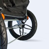 InnoPet Sporty EVR dog stroller with rubber all terrain wheels and a spacious cabin for comfortable rides on city routes and forest paths